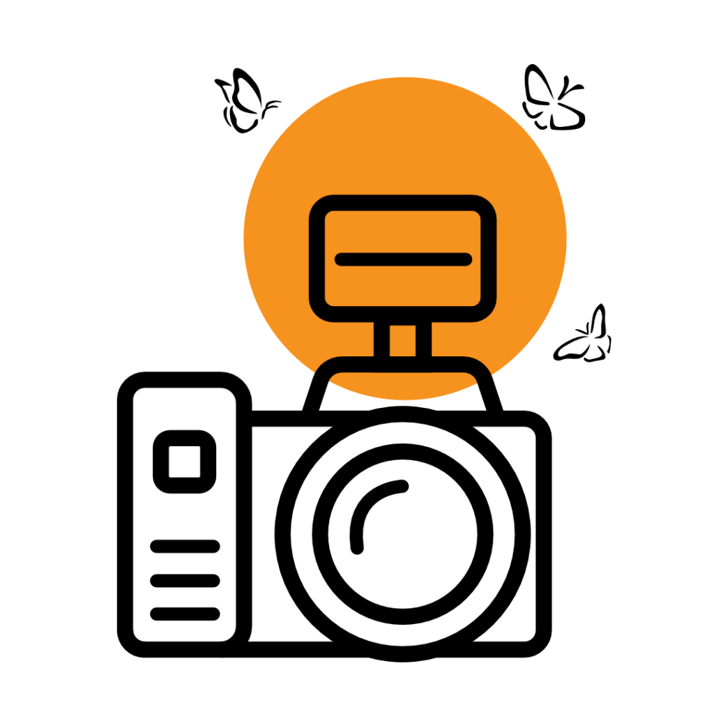 A simple, stylized black icon of a computer monitor on a stand, set against an orange circular background. The icon represents technology or computing and is depicted with clean, minimalistic lines