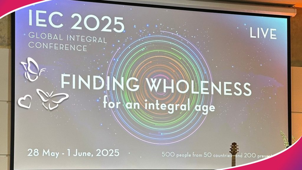 An image of a powerpoint slide from the 2025 "Global Integral Conference" the title says "Finding Wholeness for an integral age".