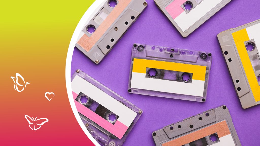 Several brightly coloured vintage cassette tapes arranged on a purple background, with a gradient panel of yellow to pink on the left side decorated with white butterfly and heart graphics.