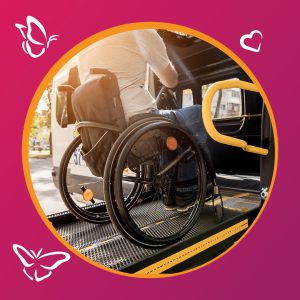A person using a wheelchair boards a van via an accessibility ramp in warm afternoon light. The scene highlights independence and inclusive design, with yellow safety rails and a textured ramp surface. The image is framed by a pink border with butterfly and heart icons, adding a gentle, uplifting tone.